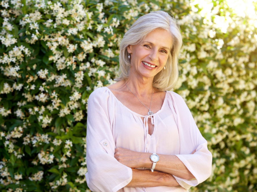 Happy older woman with visible expression lines in a blog about anti-wrinkle consultation in Adelaide.